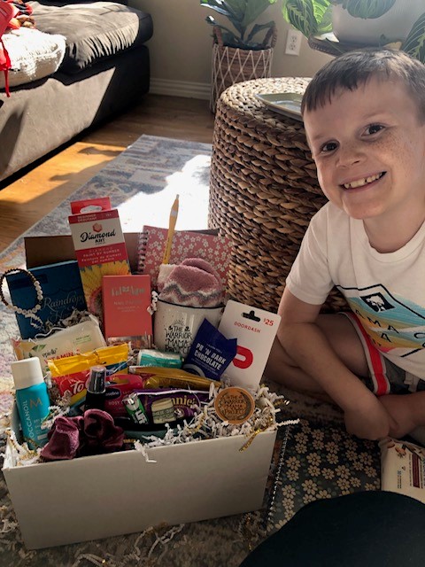 Child Receiving Warrior Mama Project Care Package